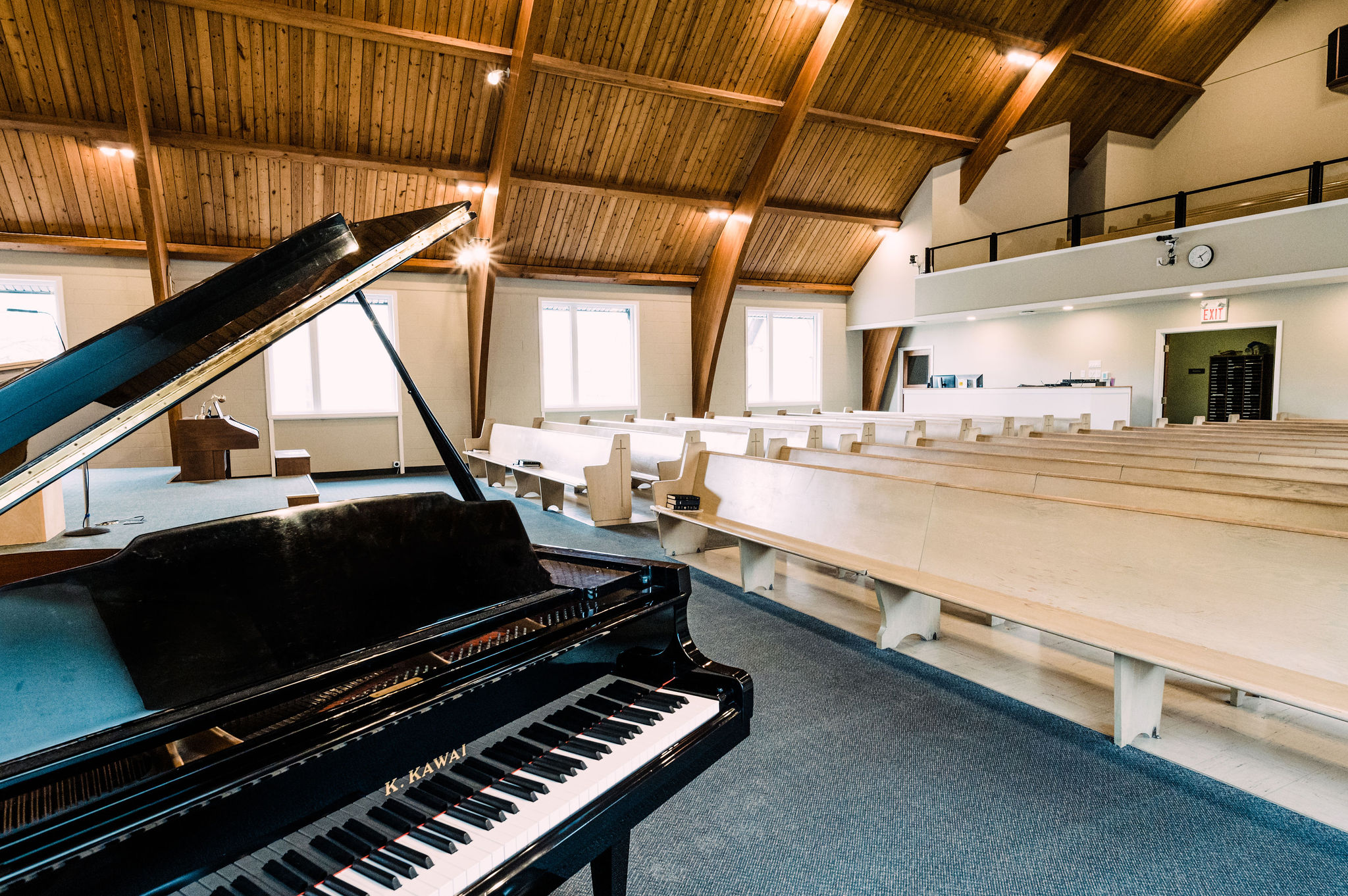 Pews and piano in the Redeeming Grace sanctuary